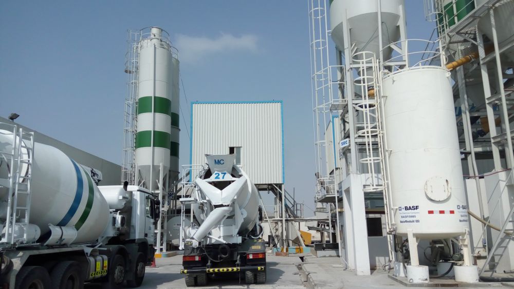 Cement silos, admixture tanks and mixer truck loading at the Modern Mix batching plant